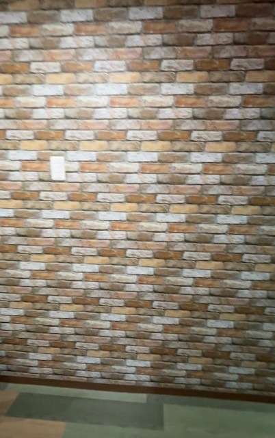 団地の網戸の造り替えと玄関廊下のクロス、床貼替え工事